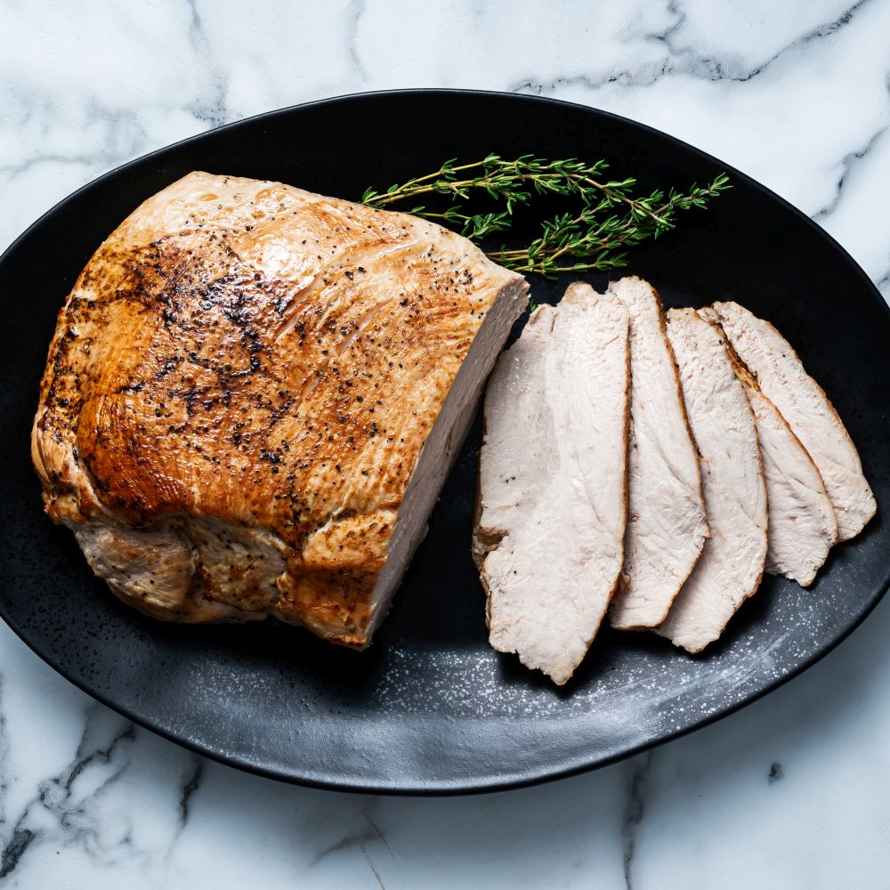 Sliced Roasted Turkey Breast on plate