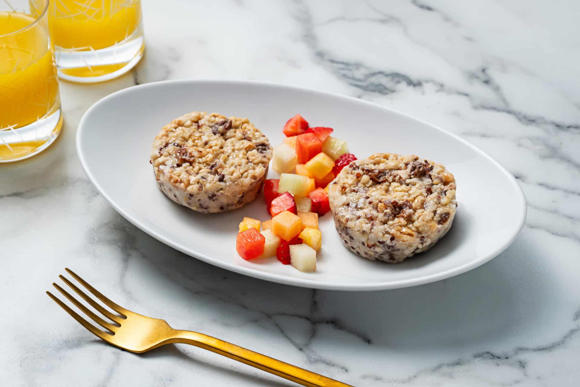 oatmeal bites on plate with fruit