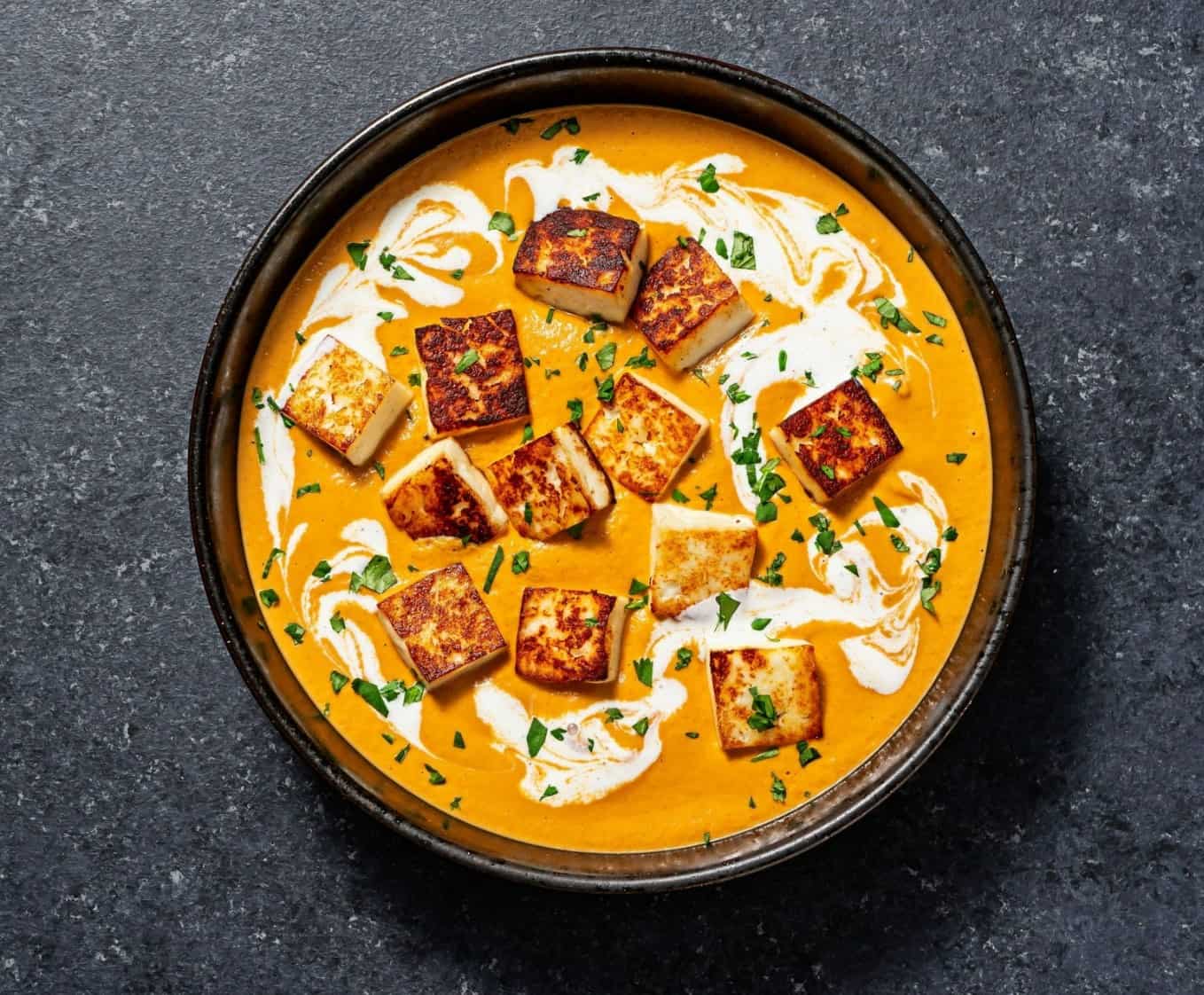 Paneer cheese in creamy tomato soup
