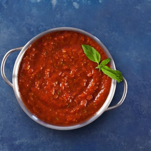 red pizza sauce in a pot