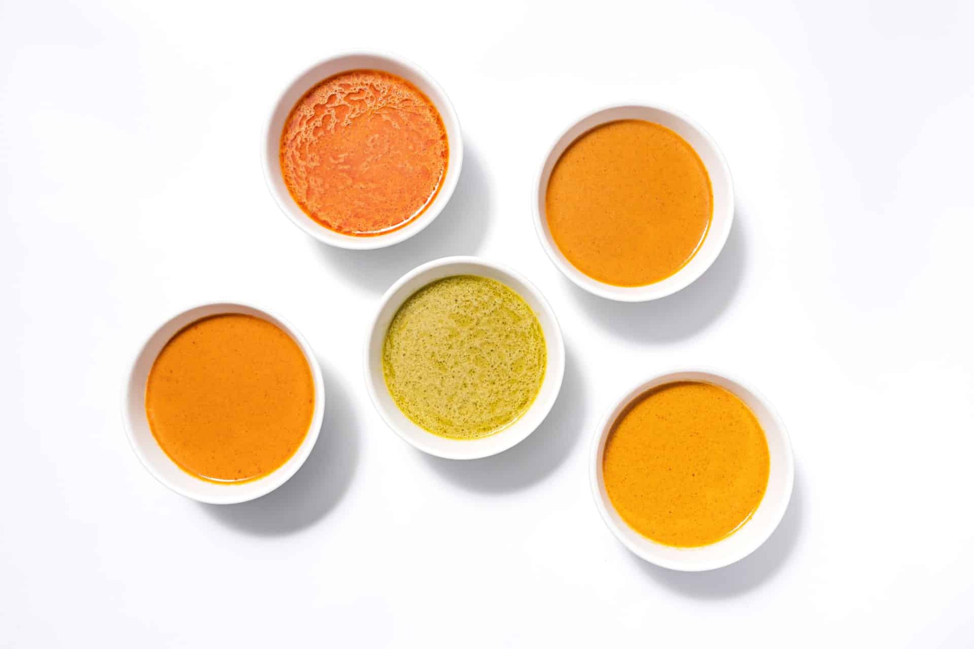a variety of sauces in bowls