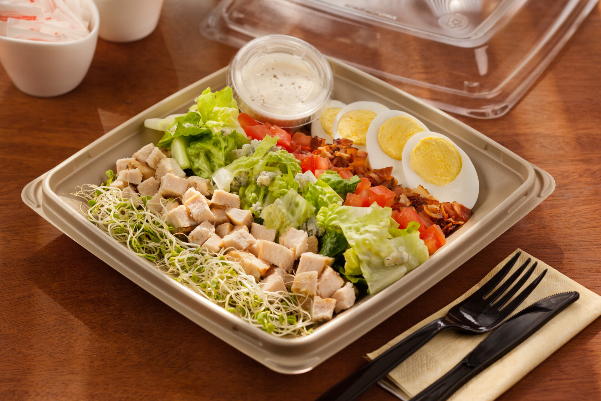 chicken pieces in a cob salad