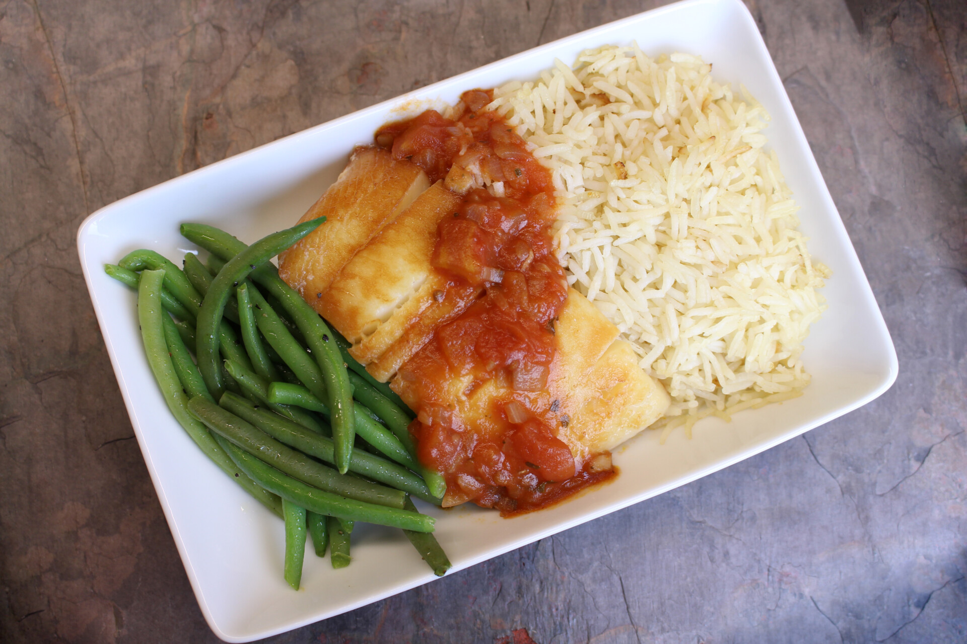 Smoky tomato sauce over turbot with green beans and rice